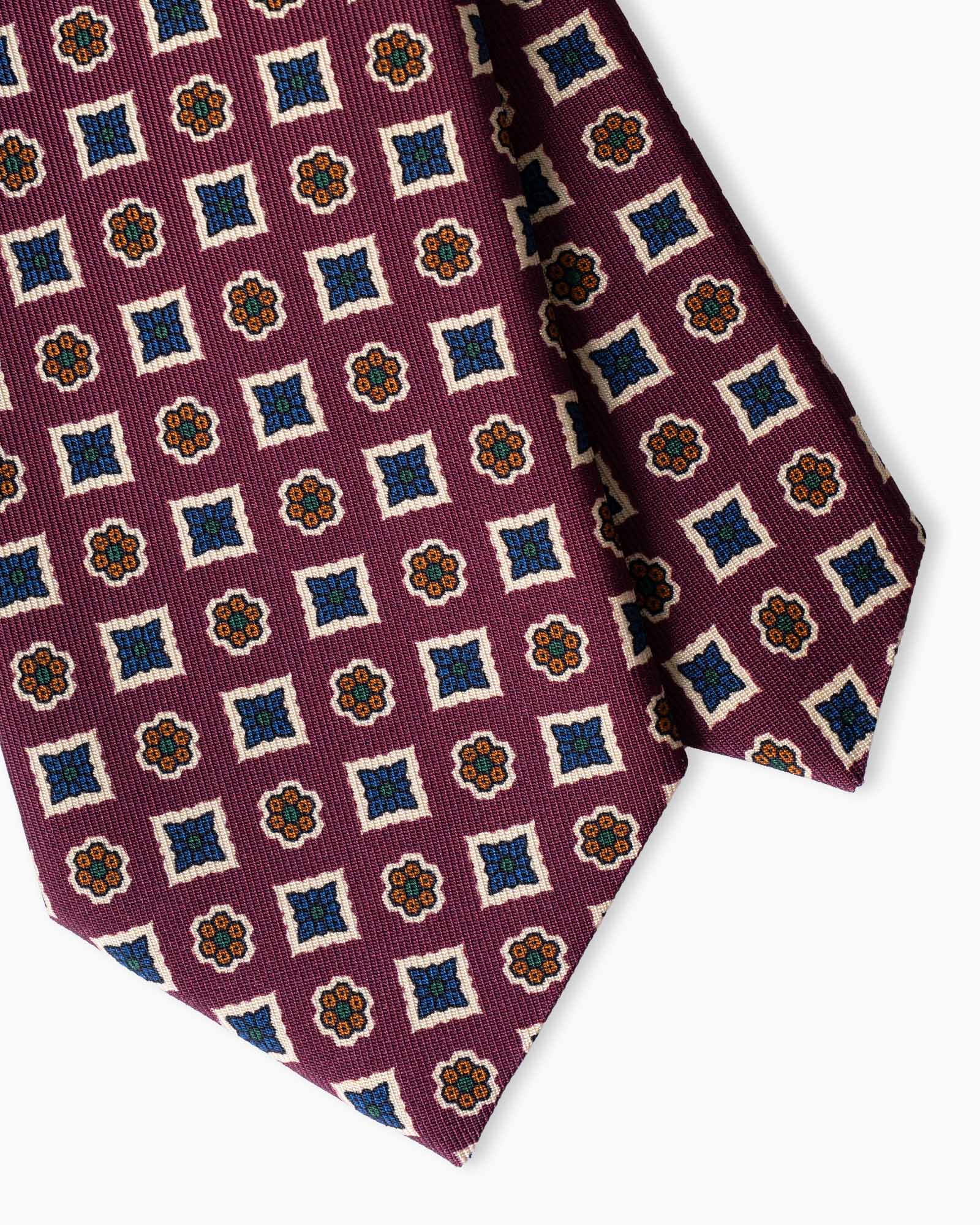 Italian madder silk tie made in Italy in bordeaux with elegant geometric floral motif