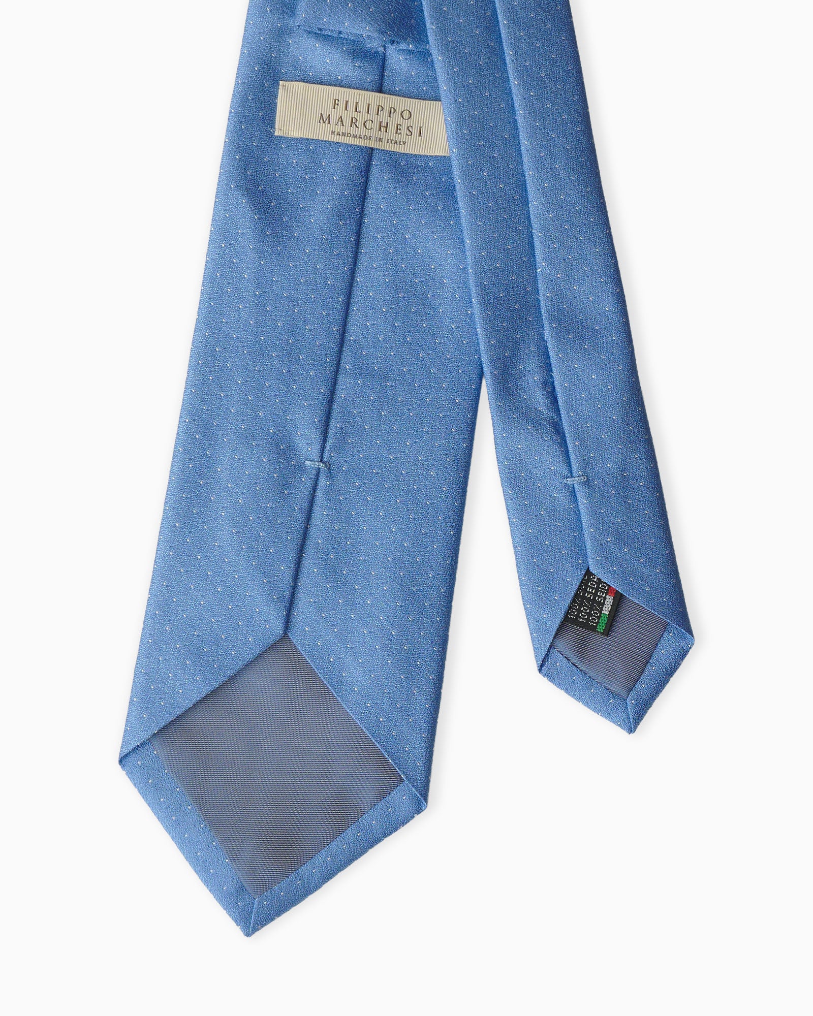 Cravatta artigianale celeste in seta jacquard 3 pieghe con motivo pois