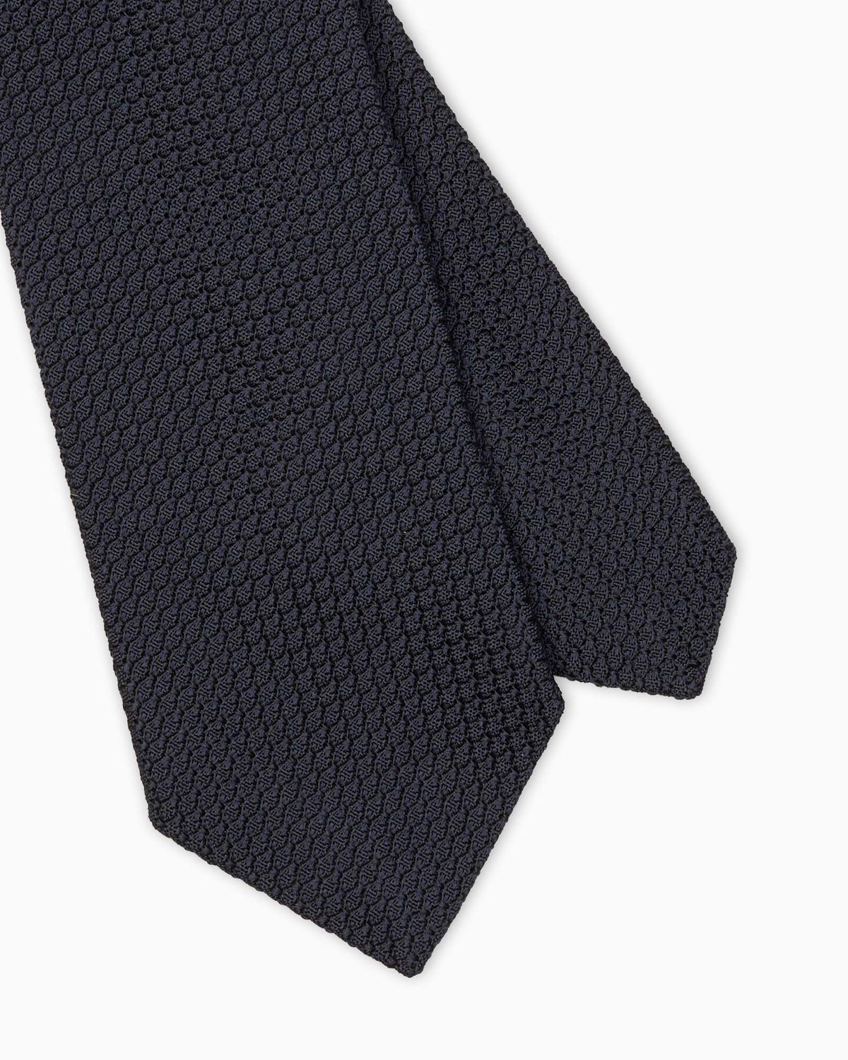 Blue silk tie featuring a coarse grenadine weave.