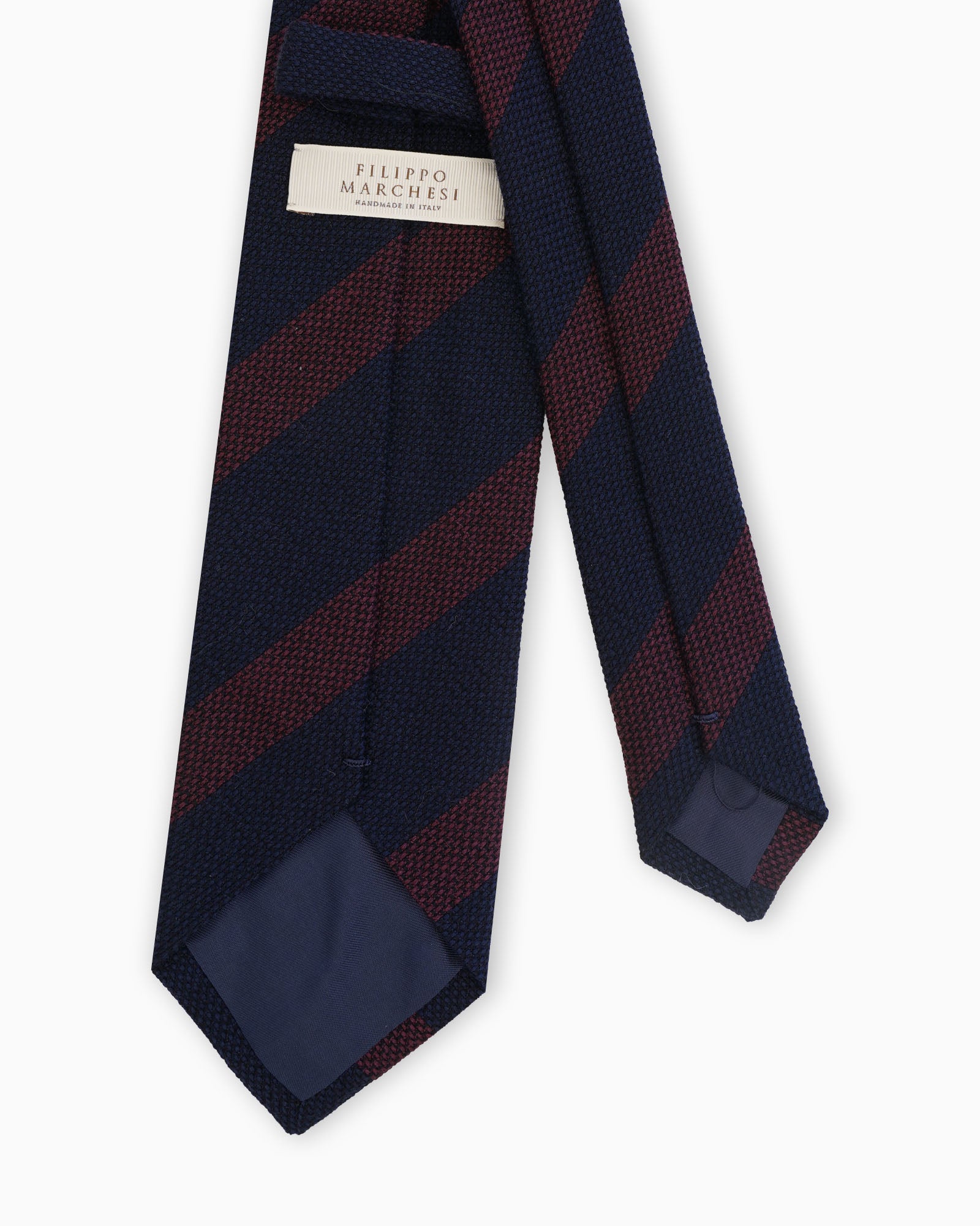 Cravatta artigianale regimental blu navy e bordeaux in lana e seta a righe
