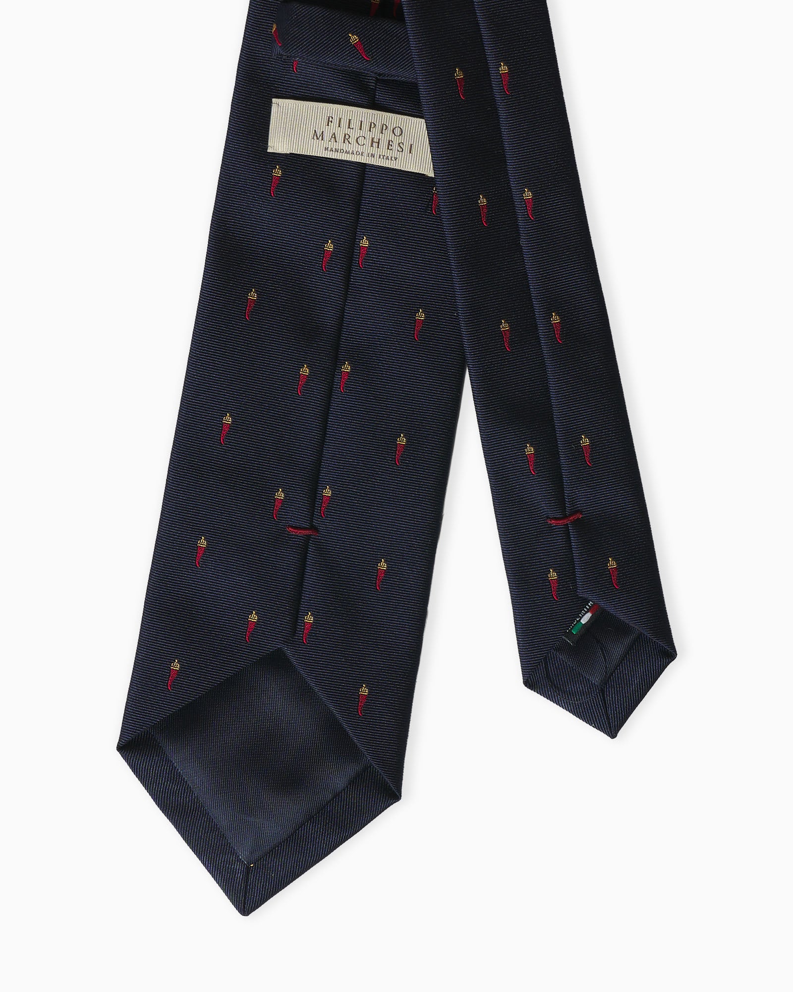 Cravatta su misura artigianale blu in seta jacquard con motivo cornetti napoletani