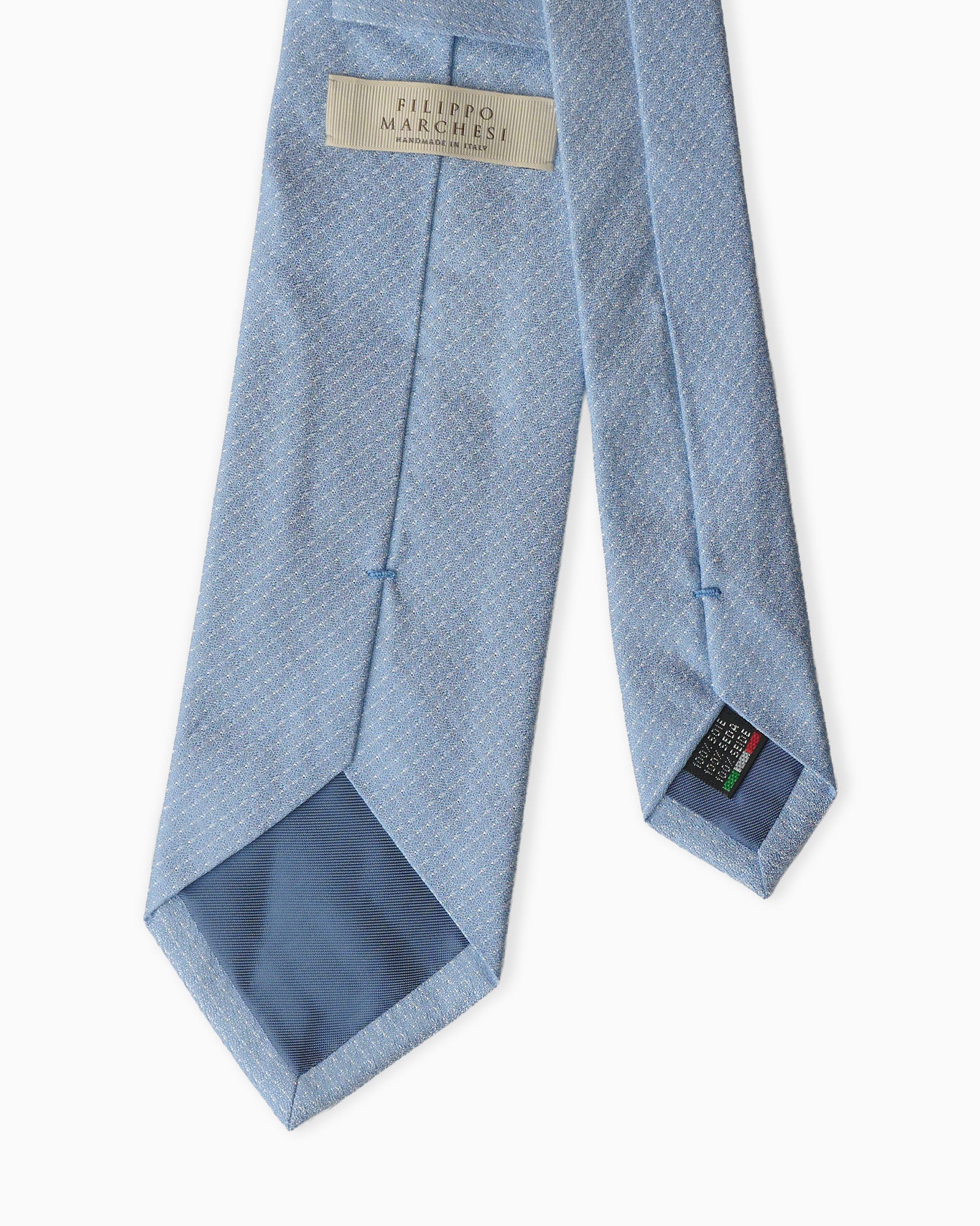 Light blue artisanal 3-fold silk tie in jacquard with elegant micro motif